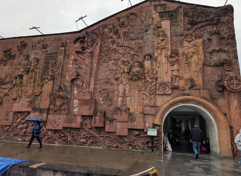 Terra cotta relief sculpted by Bernard Nebieridze on the exterior wall of the Green  Bazaar in 