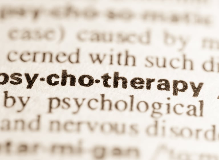 Eine Nahaufnahme von einem Wörterbuch von Psychotherapie