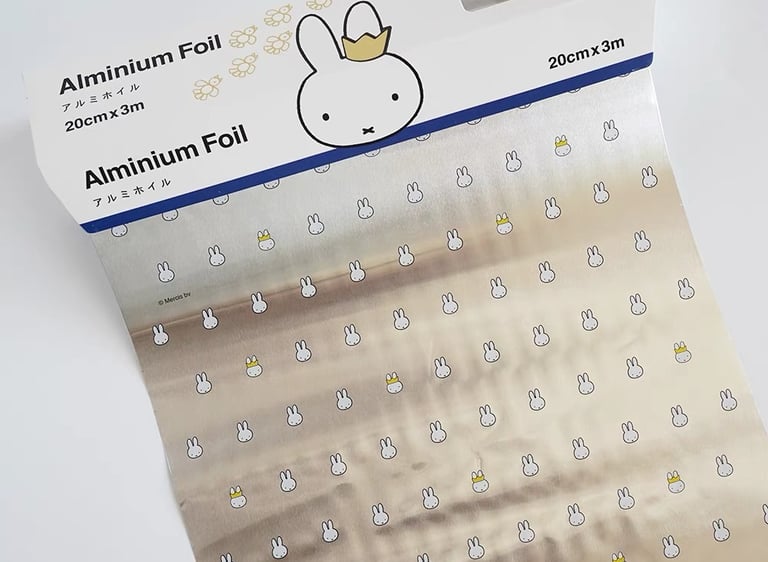 Box of 20cm x 3m printed aluminum foil featuring cute white rabbit illustrations and patterns.