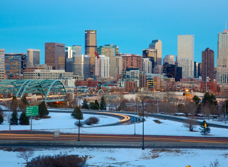 Downtown Denver skyline during winter, showcasing SparkEaseCleaning service area