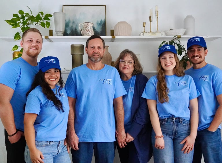 Three couples of cleaners from Chez Cleaning Services smilling for a team picture