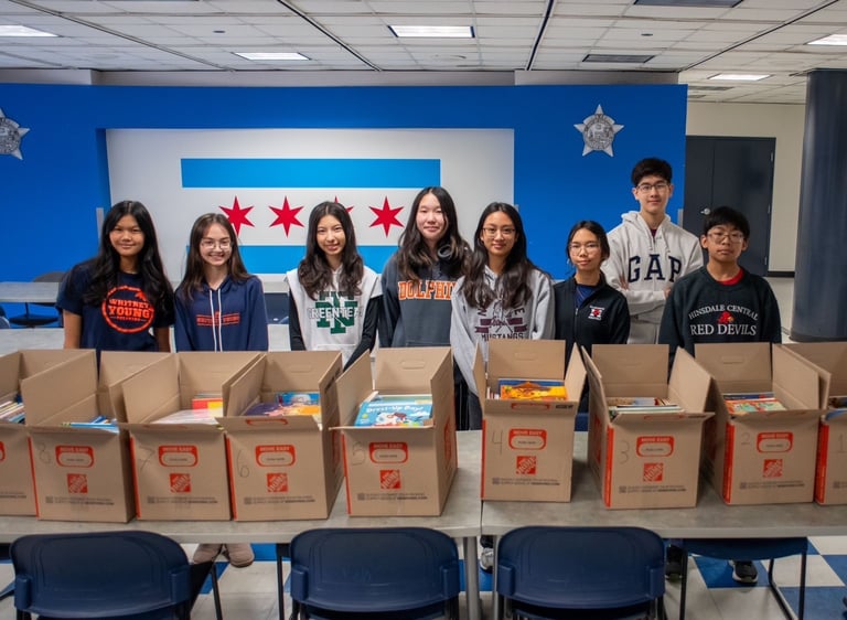 The CTYL Team was hard at work sorting books for our book drive for flooded schools in Thailand.
