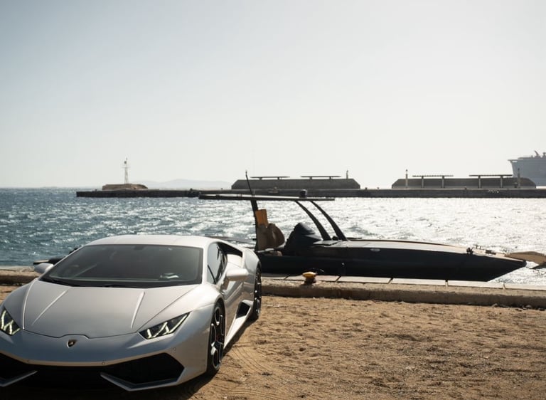 Lambo and boat mykonos port