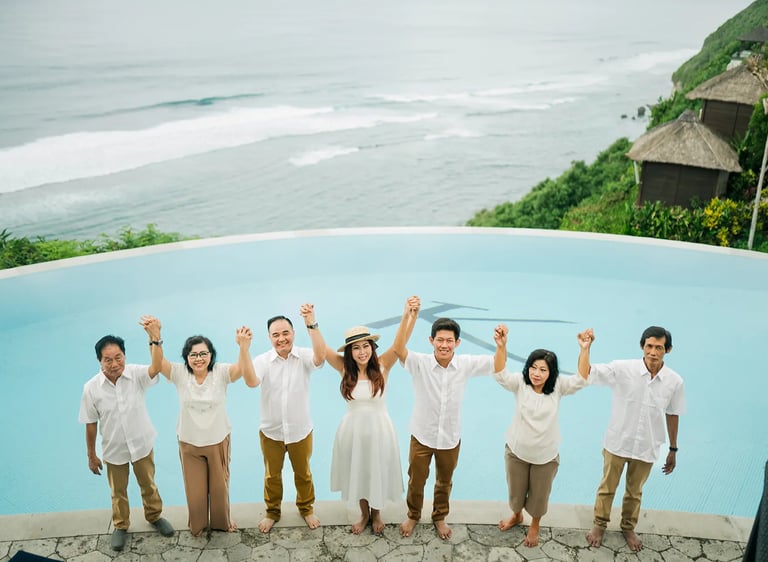 Selly family enjoying the infinity pool view at Karma Kandara Uluwatu Bali  