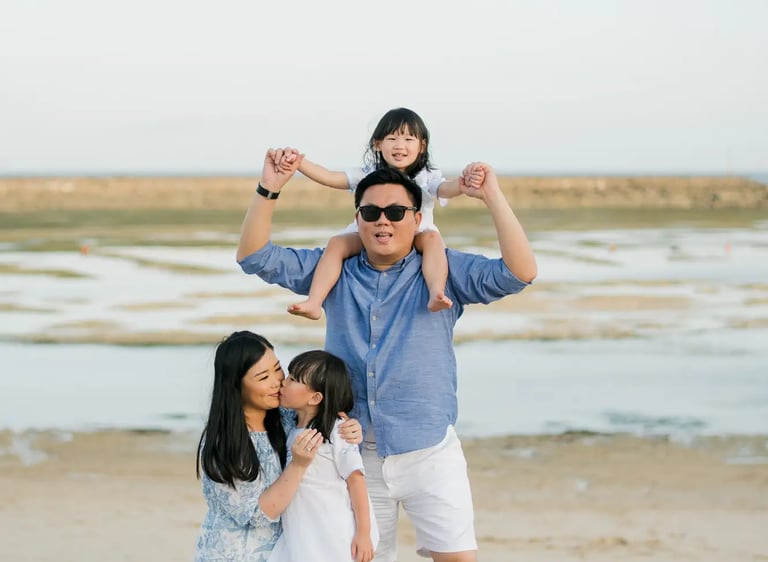 Lifestyle family photography on the beach at The Apurva Kempinski Bali