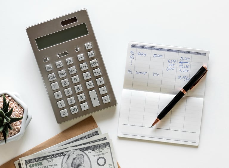 a calculator and a calculator on a desk