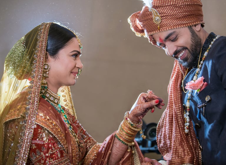 Bride and groom holding hands.