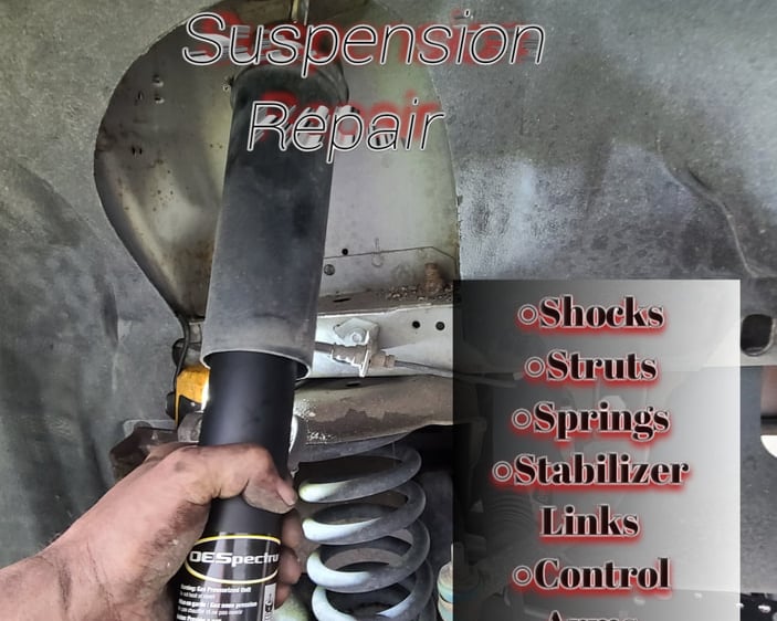 Our Mechanics arm lifting a strut into place with text that says-Fast T's Suspension Repair