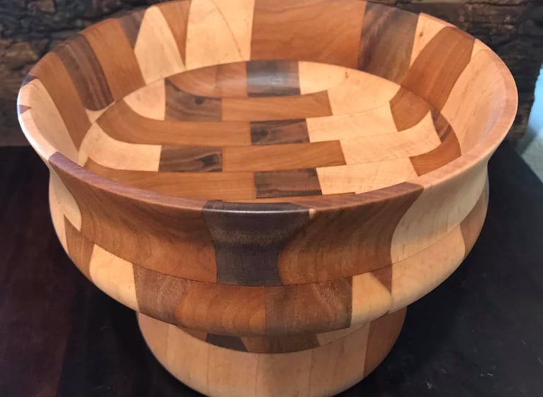 Custom wood bowl created from several recycled wood cutting boards.