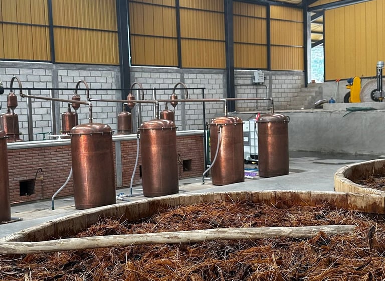 a large metal tank with a wooden handle and a wooden handle