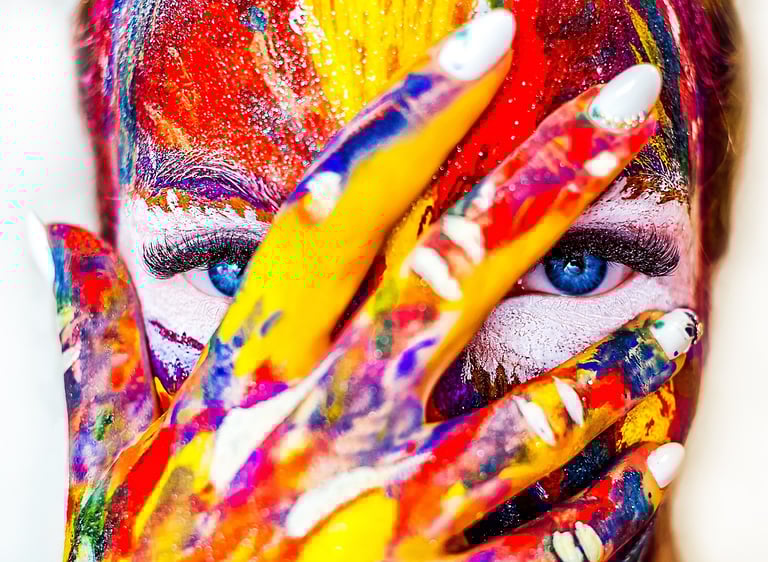 a woman with painted face paint on her face