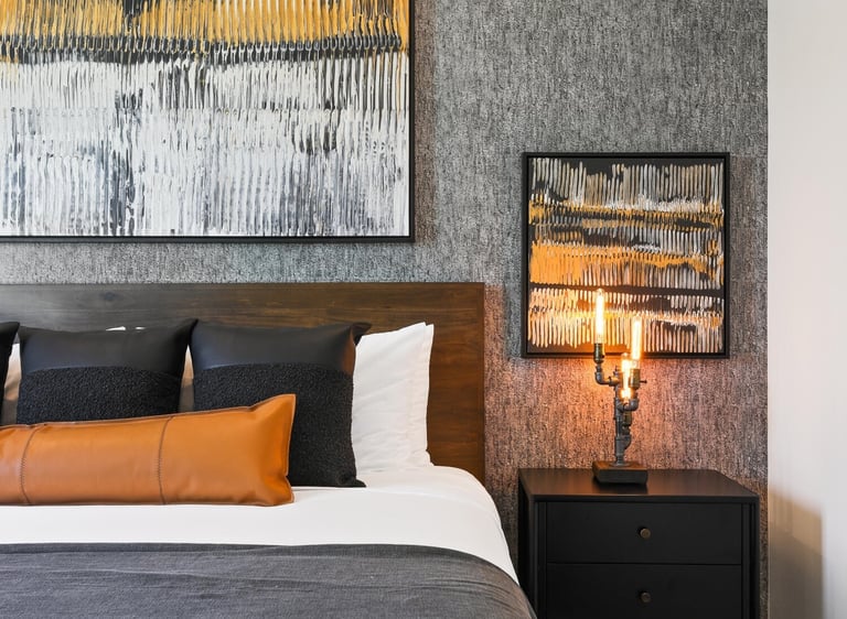 Elegant gray wallpaper accent wall in a modern bedroom, adding texture and sophistication to the space