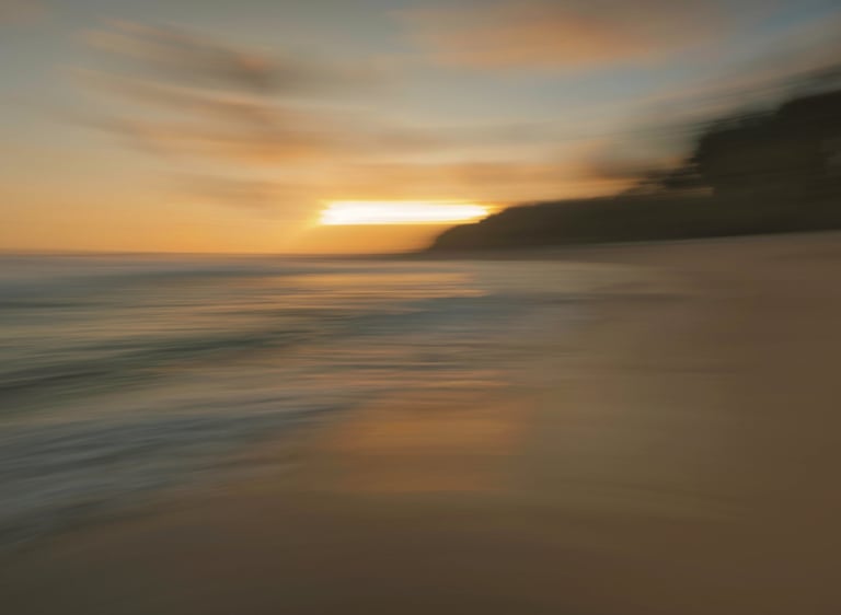 Abstract long exposure of a sunset at Savinia beach in Mauritius, with blurred motion creating a dreamy and surreal effect