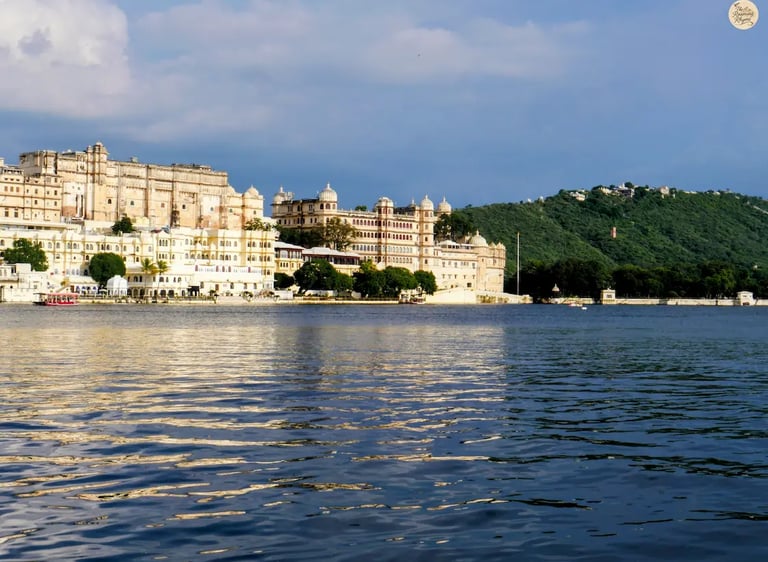City Palace reflecting over Lake Pichhola as seen from Ambrai Ghat, Udaipur Rajasthan.