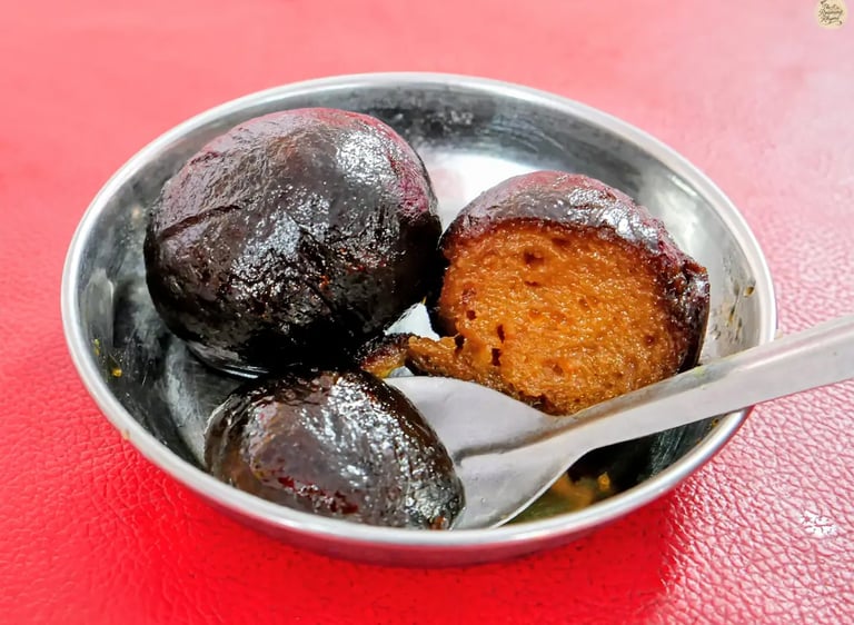 Close-up of delicious Hathijam, a traditional sweet, at Kota Dussehra Mela.