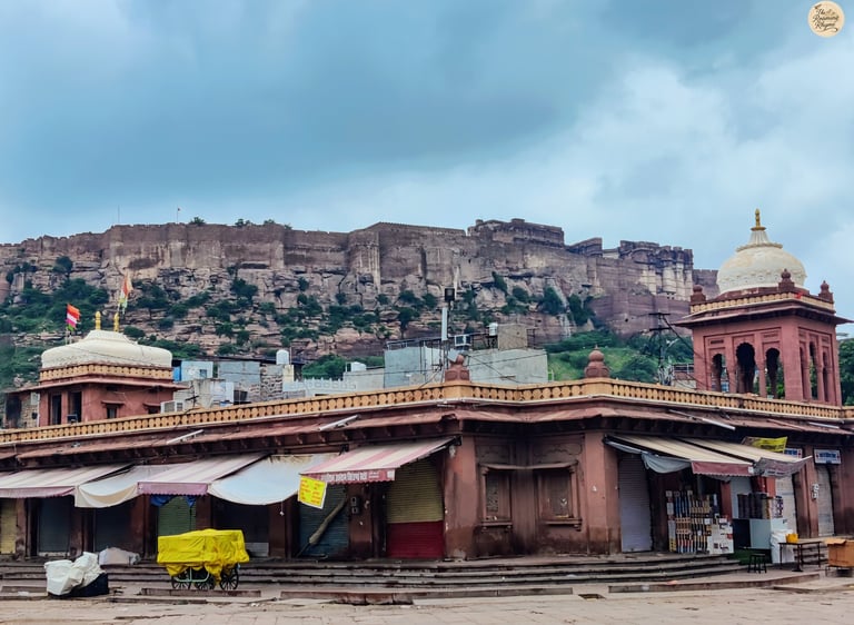 Mehrangarh Fort towering above the closed shops of Sardar Market in Jodhpur’s Blue City on a peaceful morning.