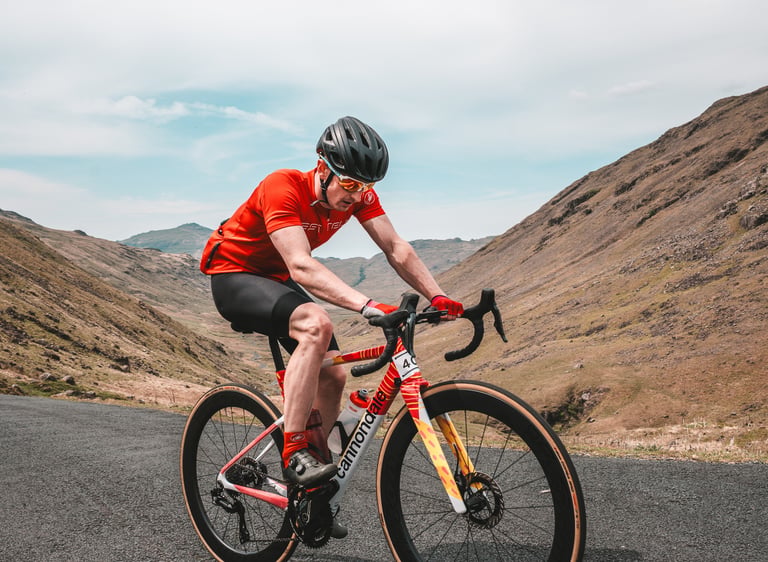 a photo of a road cyclist competing in the fred whitton sportive