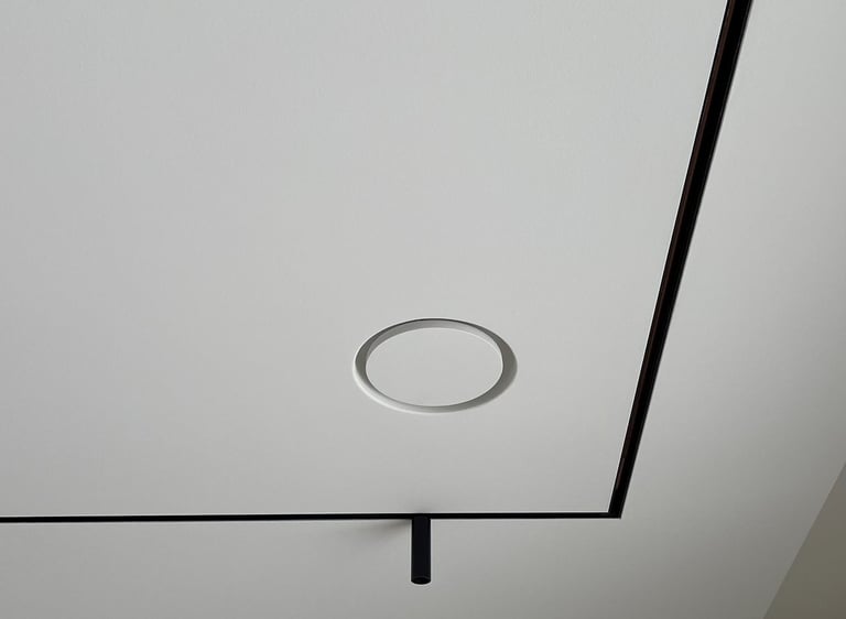 ERGOVENT RONDO round frameless diffuser flush-mounted in white gypsum ceiling, invisible after installation