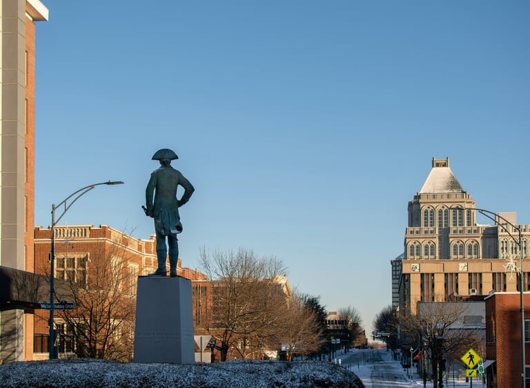 Shot of Downtown Greensboro and a statue of General Green