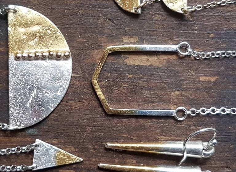 Silver and gold Lagoon pendants
