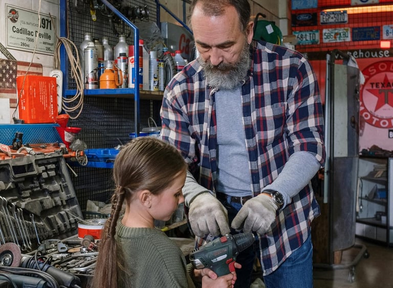 Dad and child learning home repair skills at Men’s Foundry father-child night
