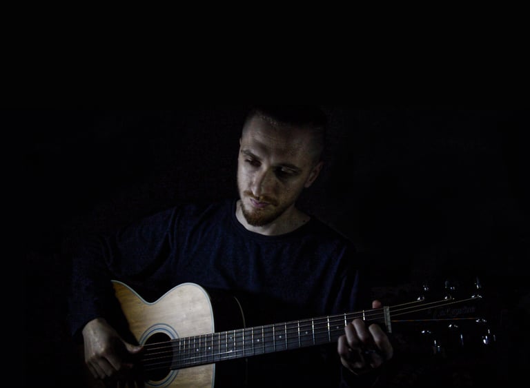 Valah, independent solo artist, passionately playing guitar and showcasing original music.