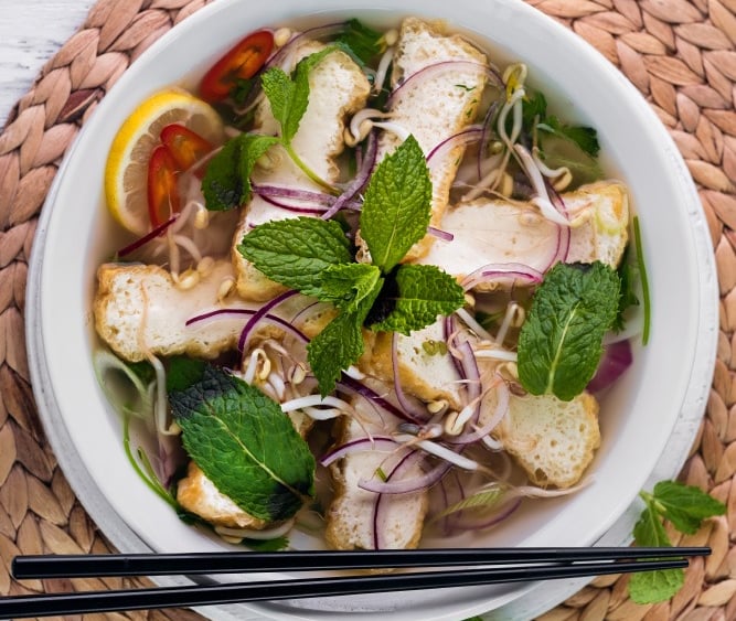 a bowl of food, pho, tofu and noodle