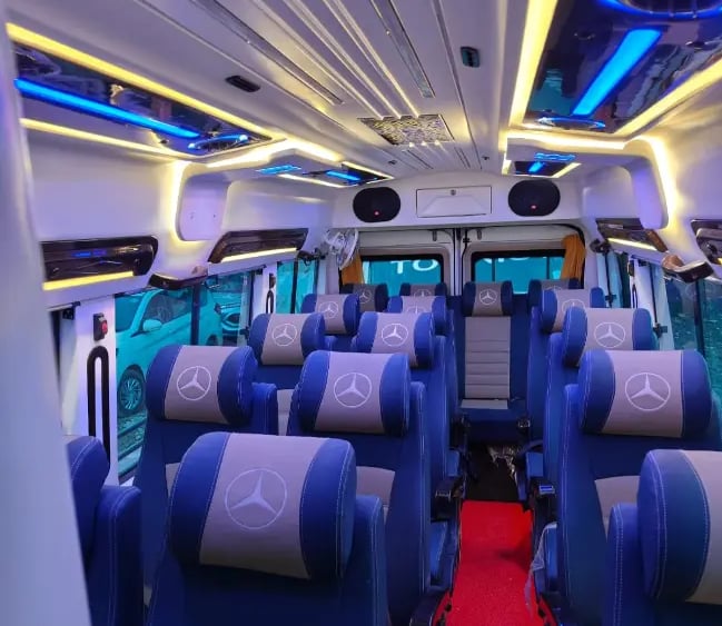 16 seater luxury tempo traveller interior on rent in Delhi ideal for family and group travel