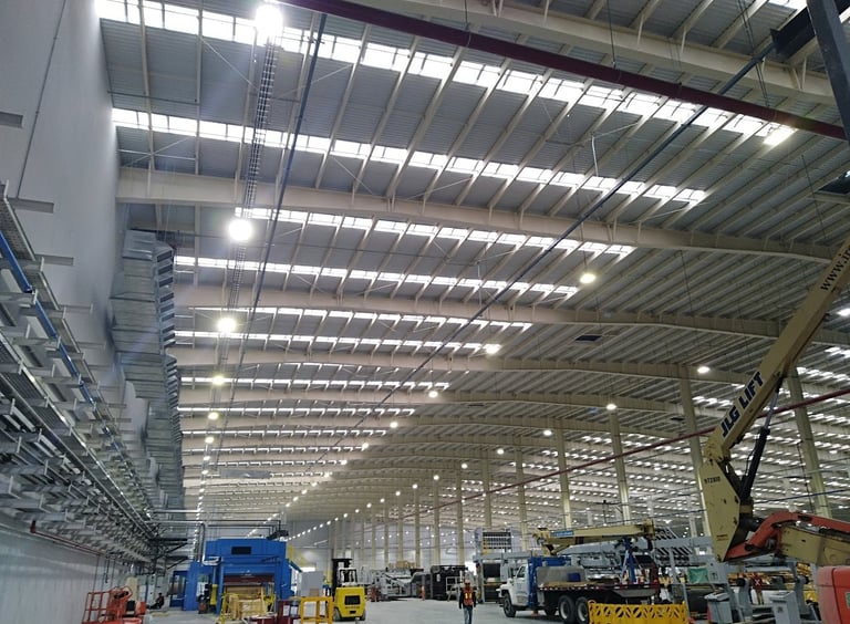 a large warehouse with a lot of machinery and equipment