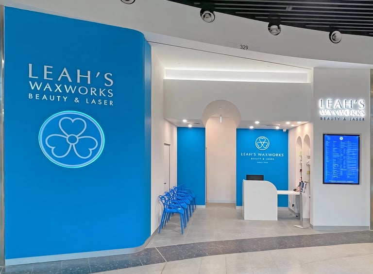 Beauty and Laser salon's shopfront, with main logo, pricing display, product display, reception and waiting areas.