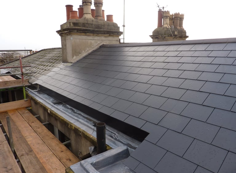 New slate roof in progress