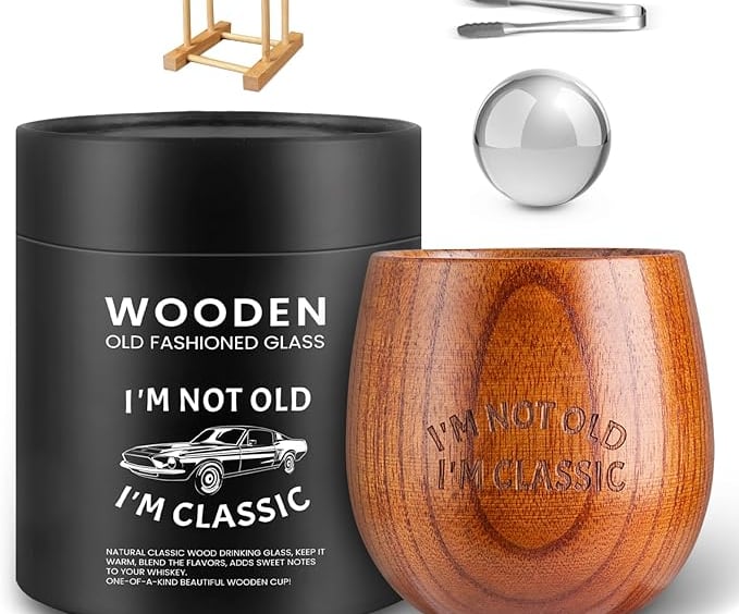 a wooden wine glass with a wooden spoon and a wooden spoon