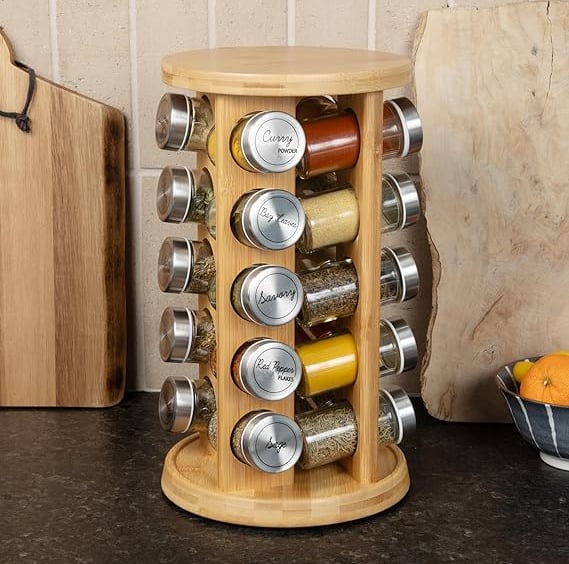 a wooden spice rack with spices and spices