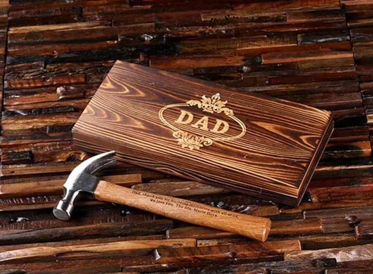 a hammer with a wooden box