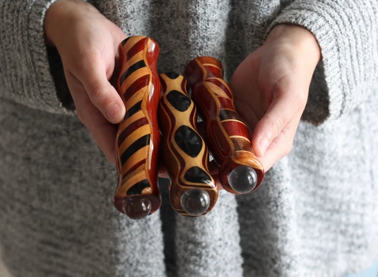 a person holding a pair of Teleidoscope with a zebra print