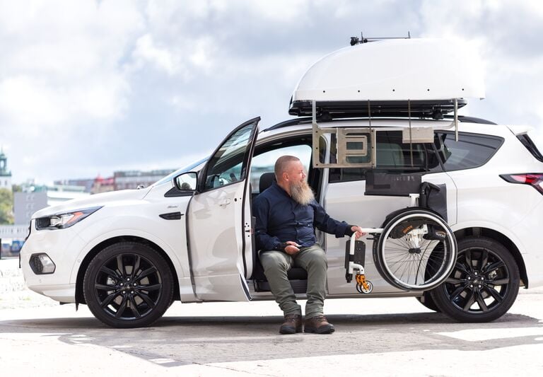 automobilis žmogui su negalia