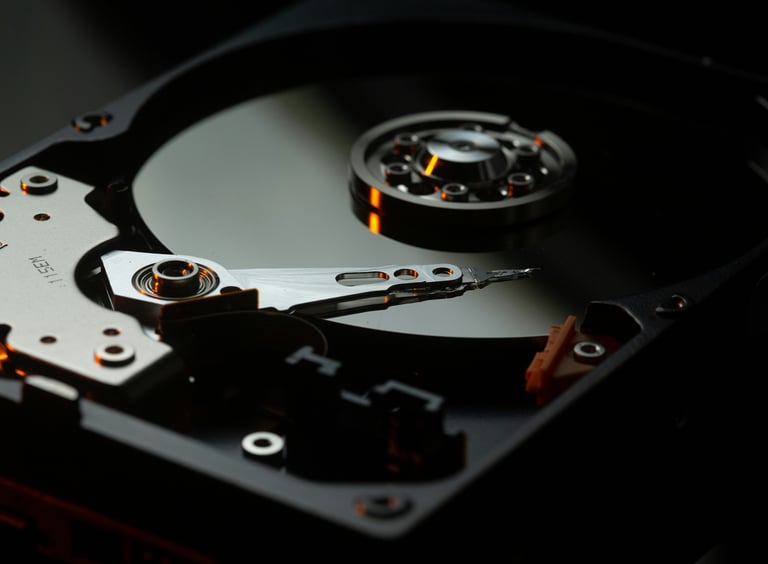 a photo of a hard drive with the platter exposed