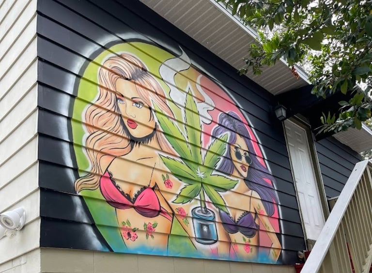 Exterior 2 beautiful girls Orlando Downtown Flower Girl Greenhouse dispensary, a local dispensary near me option in Florida