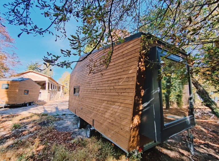 a tiny house with a tiny house on wheels