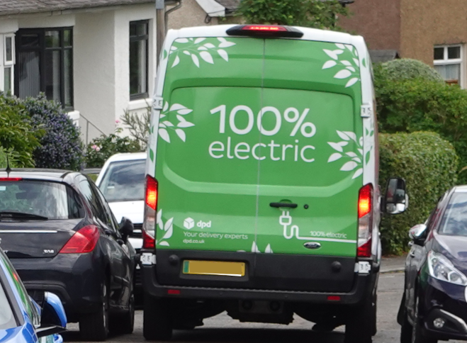 Van squeezes between parked car in Belmont Gardens June 2024 (c) H Ross