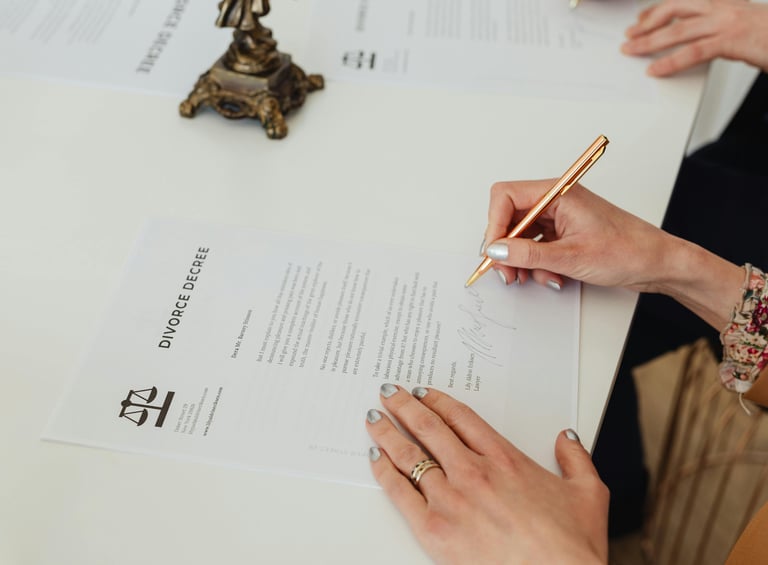 a woman is writing a letter to a man who is sitting at a table