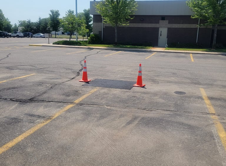 asphalt-repair-in-a-parking-lot.jpg