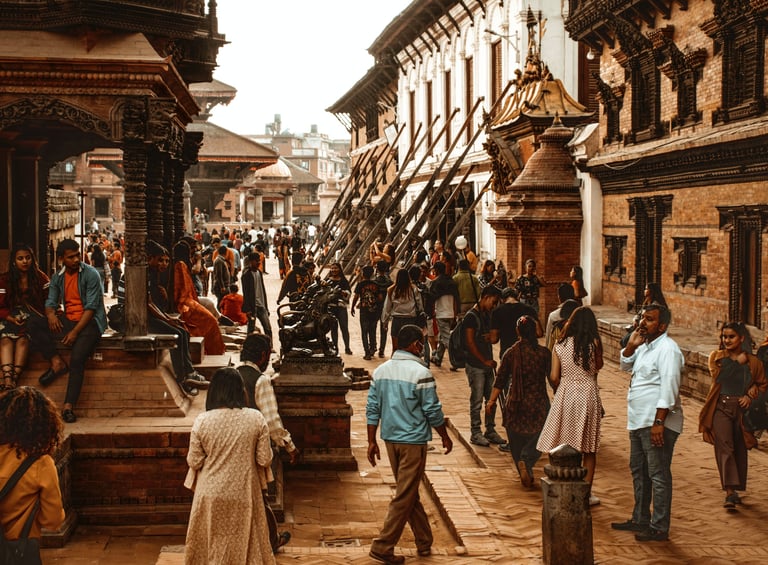 a group of people walking down a street