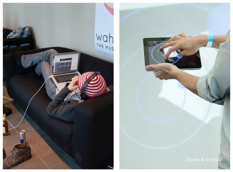 Ein Mann mit einem gestreiften Hut, der auf einer Couch arbeitet, und ein Mann, der ein iPad für ein