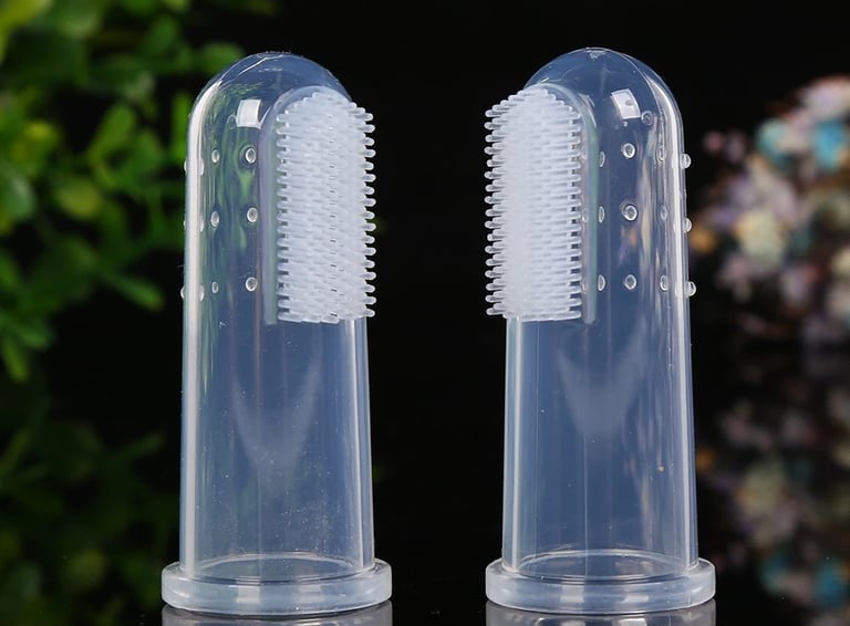 a image showing finger toothbrushes