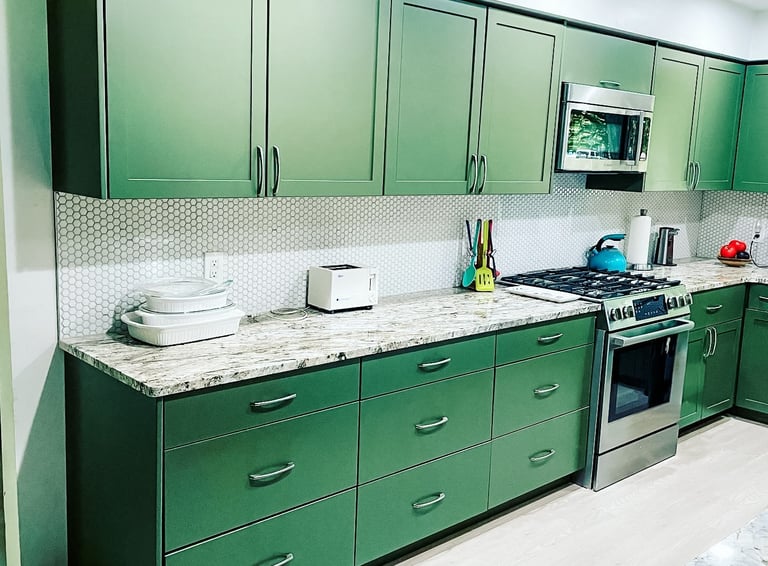 Custom upper and lower kitchen cabinetry in a unique finishing color, designed and handmade.