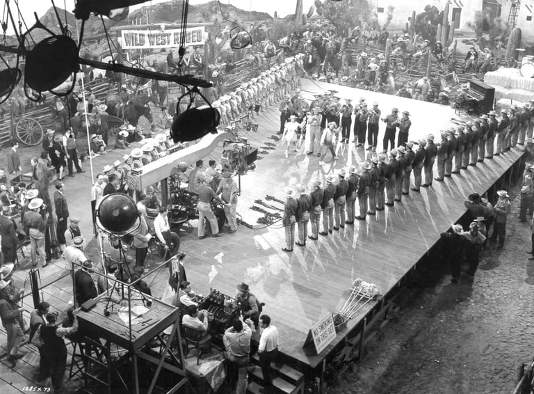 Berkeley and crew filming Judy Garland and Mickey Rooney’s “I Got Rhythm” with cowboy dancers.