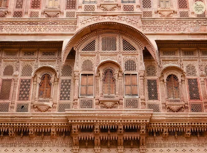 Delicate red sandstone lattice jharokhas of Jhanki Mahal at Mehrangarh Fort Jodhpur.