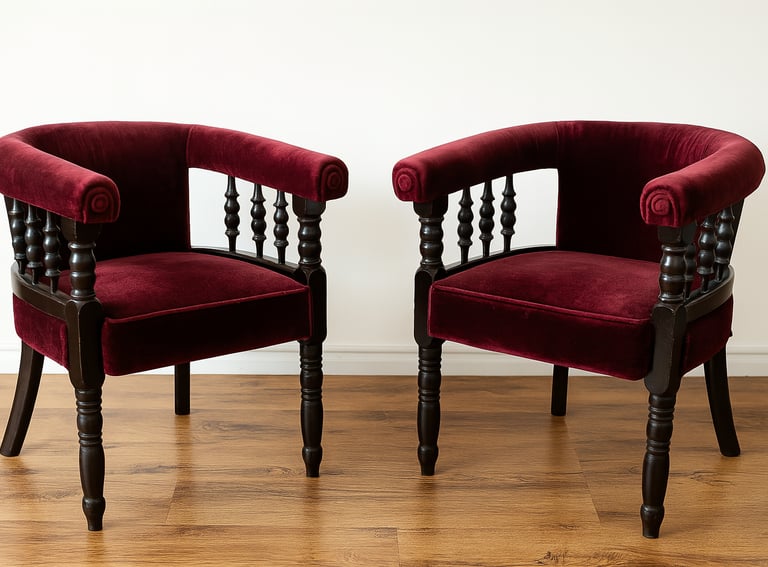 Pair of red velvet antique armchairs with wooden frames