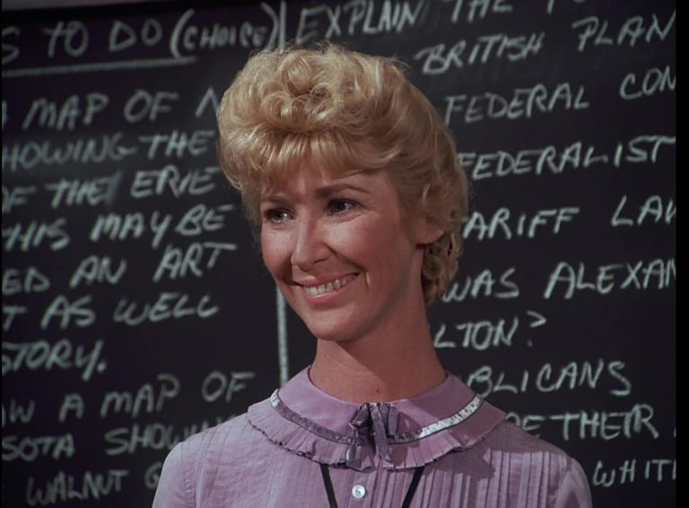Charlotte Stewart as Ms. Beadle from Little House on the Prairie